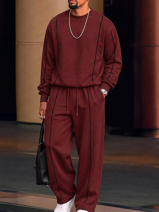 Conjunto athleisure de sudadera y pantalones con líneas en contraste