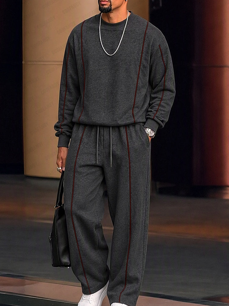 Conjunto athleisure de sudadera y pantalones con líneas en contraste