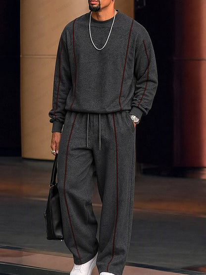 Conjunto athleisure de sudadera y pantalones con líneas en contraste