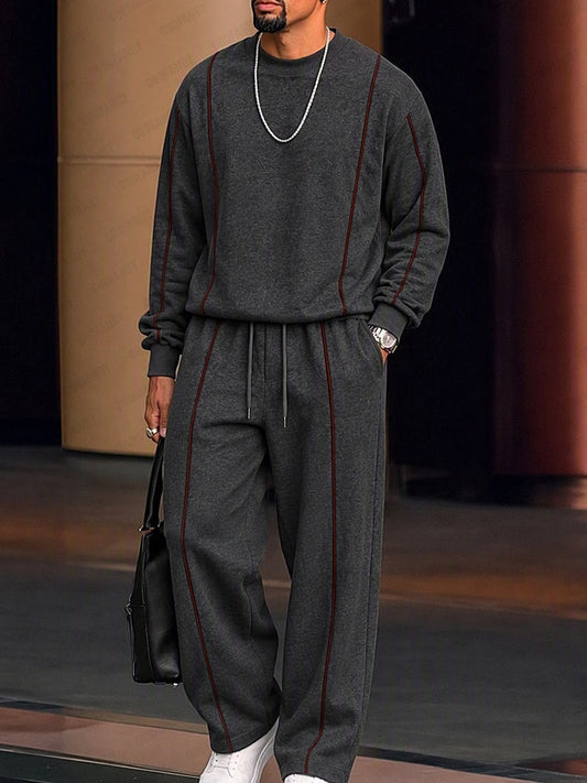 Conjunto athleisure de sudadera y pantalones con líneas en contraste