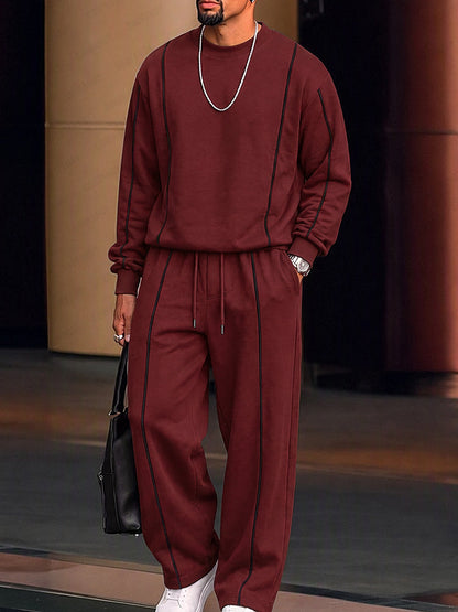 Conjunto athleisure de sudadera y pantalones con líneas en contraste
